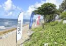 Sistema Coca-Cola realiza jornada de limpieza en la playa de Güiba