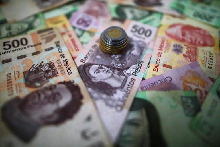 Monedas y bolsas A.Latina caen, con mercados a la espera de datos de inflación en China y EEUU